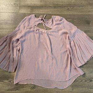 Boutique top with accordion sleeves